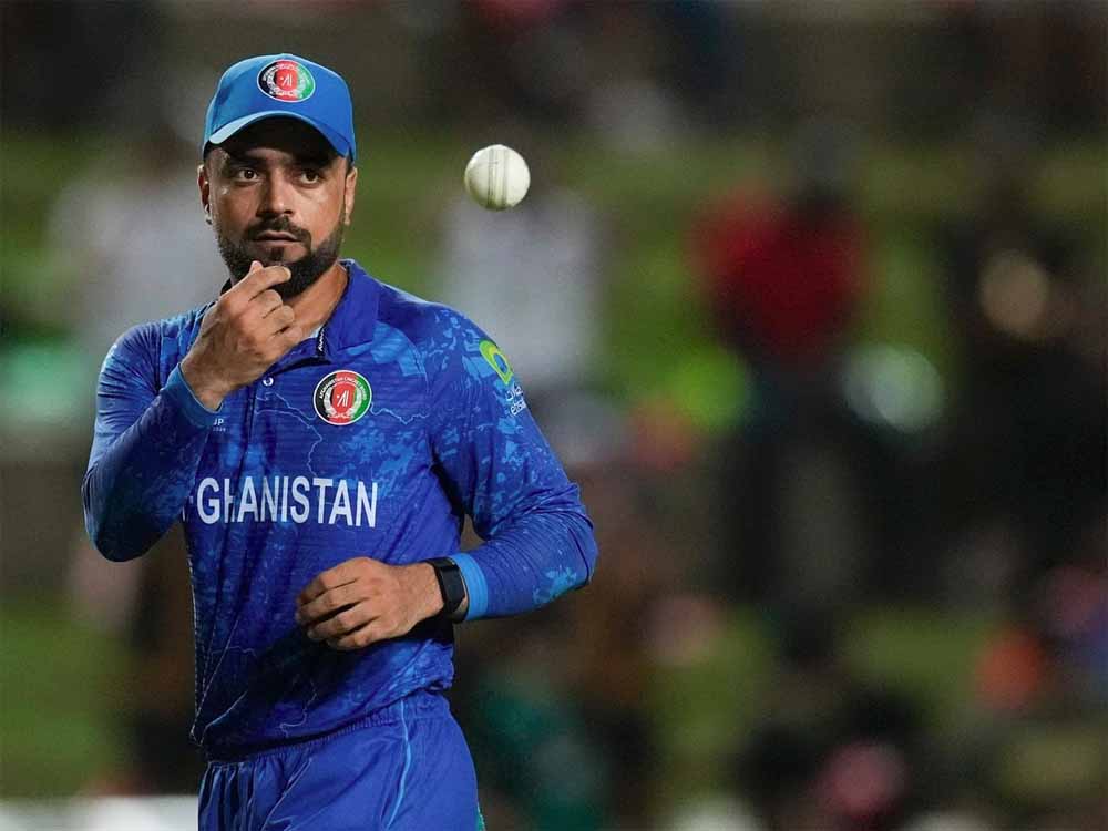 स्टार स्पिनर राशिद खान ने टी20 में सबसे ज्यादा विकेट लेने के वर्ल्ड रिकॉर्ड की बराबरी की, अब रचेंगे इतिहास स्टार स्पिनर राशिद खान ने टी20 में सबसे ज्यादा विकेट लेने के वर्ल्ड रिकॉर्ड की बराबरी की, अब रचेंगे इतिहास