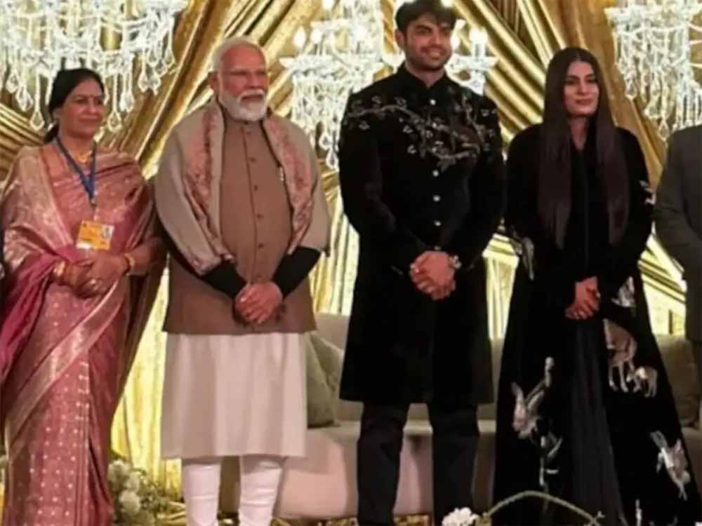नीरज चोपड़ा–हिमानी मोर के वेडिंग रिसेप्शन में पहुंचे पीएम मोदी, VIDEO हुआ वायरल